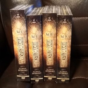 My collection of Wrestle Mania DVDS